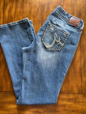 Maurices Women's Blue Boot Cut Jeans with Embroidered Back Pocket